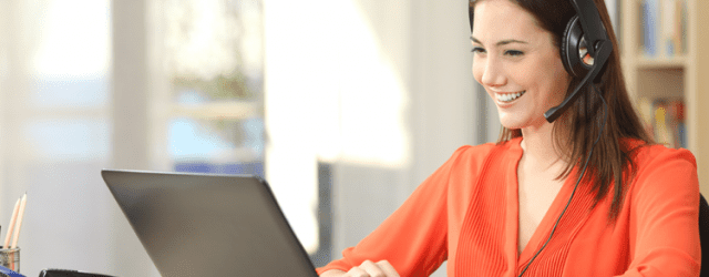 A-woman-wearing-a-phone-headset-working-on-a-call